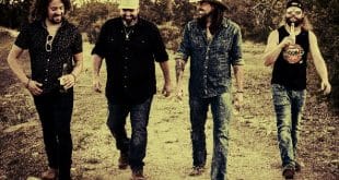 WATCH: Rick Monroe & The Hitmen's "Which Way Is Home"